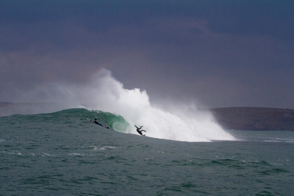 Local surfer Dicky take a nasty inverted trip over the ledge. Photo Luke Gartside