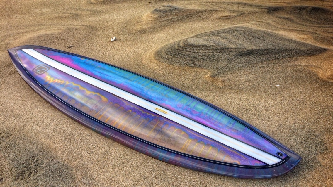 A Jay Surfboards resin-tint asymmetrical surfboard